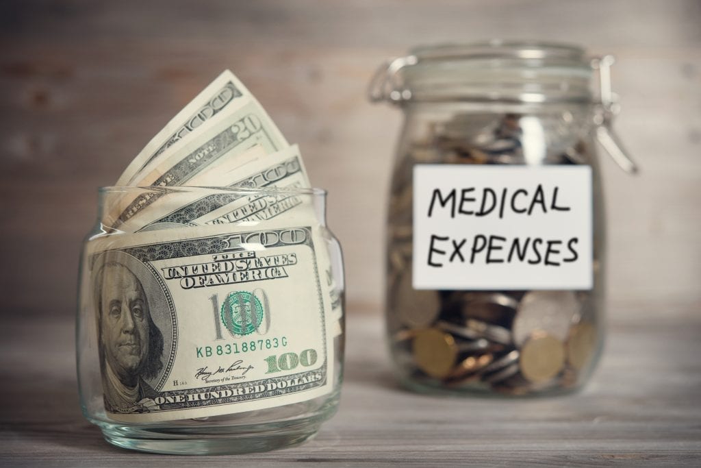 jar of money labelled medical expenses