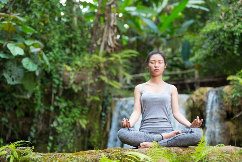 woman in meditative pose