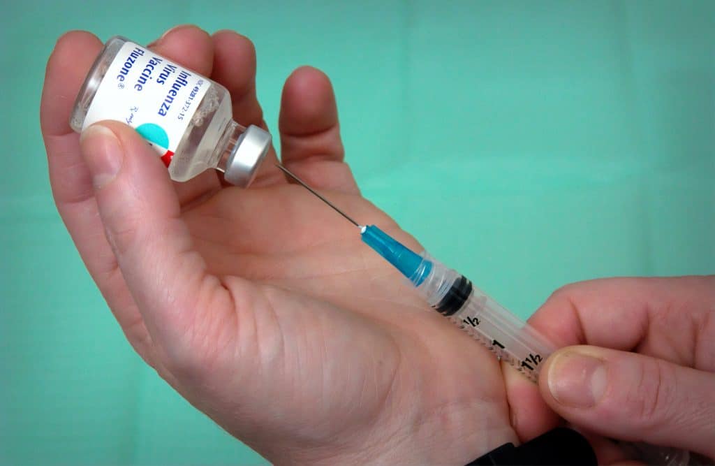 vaccine vial and syringe